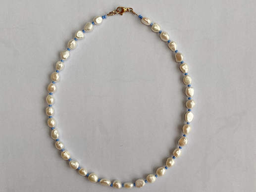 Grote parels met blauwe kralen 