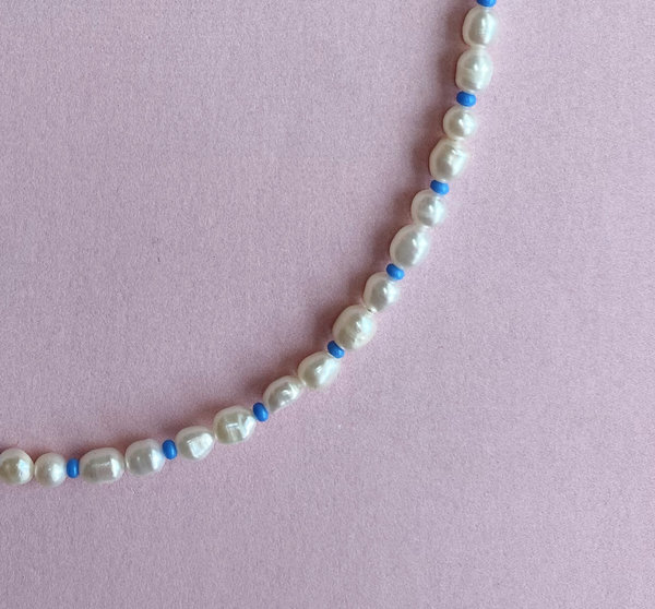 Kleine parel blauw detail